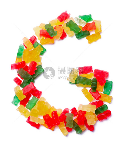 英文字母G来自白色孤立背景上的多色咀嚼果酱由儿童糖果熊制成的食物图案儿童设计图片