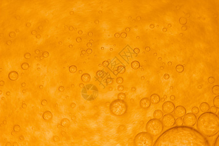 带有气泡的抽象橙色背景图片