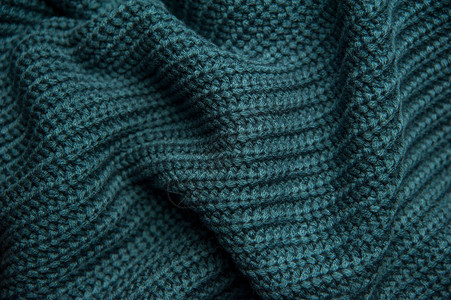 羊毛针织绿蓝色毛衣的质地图片