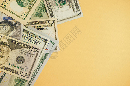 钱币背景素材美元关闭概念美元在黄色背景下现金钱币背景