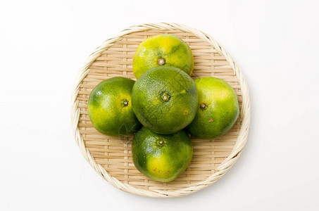 柑橘温州竹筛上的橘子蜜柑图片