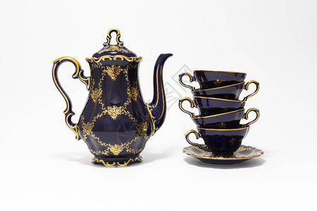 美丽的钴蓝色复古瓷茶具的特写镜头背景图片