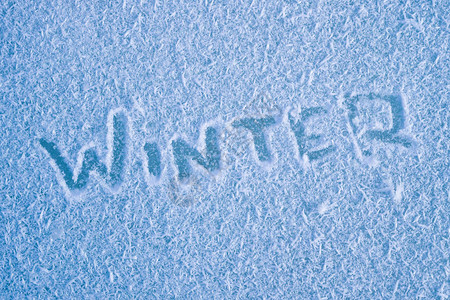 用手指写在上面的冰霜冬天寒冷的季节图片