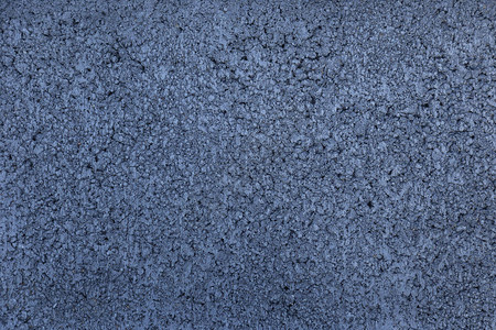 沥青路面深蓝色沥青背景深蓝色沥青表面带小石图片