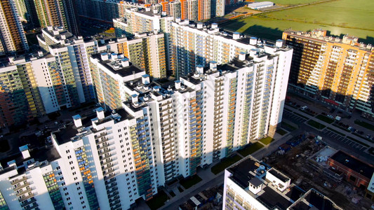 一个有大量新建高层建筑地球人口过剩和大城市的建筑工地多层住宅图片
