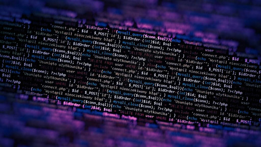 紫黑色独特的背景笔记本电脑屏幕上的编程语言程序代码PHPHTMLJavaScript网站笔记本电脑上的计算机代码图片