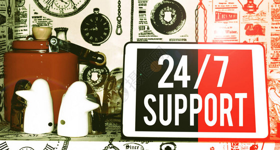 显示24或7支持的文本符号每周天小时为客户提供商务照片文字支持经典企鹅陶瓷和老式茶壶图片