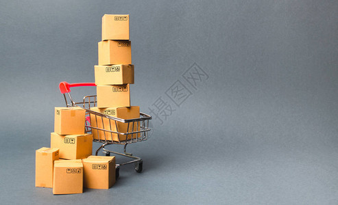 带盒子的购物车超市产品的销售概念商务图片