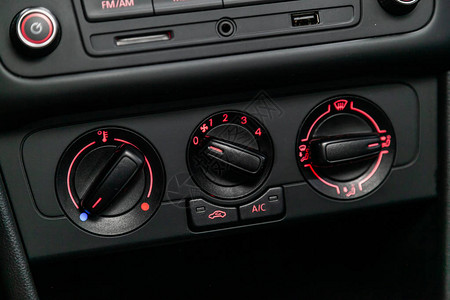 现代黑色车内部用空调按钮的背景