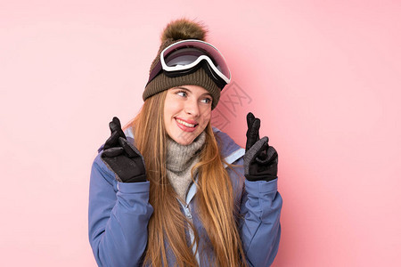 穿着滑雪眼镜的滑雪少女图片