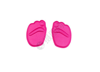白色背景上的孤立矫形粉红色鞋垫扁平足和部疾病的治疗和预防足部护理图片