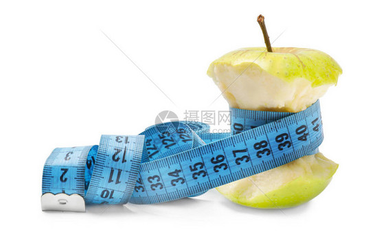 苹果核心和白色背景的测量磁图片