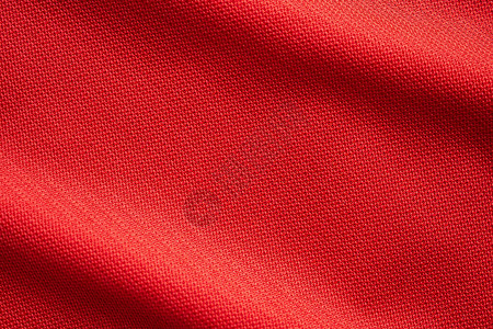穿红运动服的红运动服装足球图片
