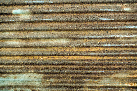 旧的生锈锌墙面表被电镀压的铁图片