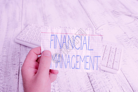 概念手写显示财务管理概念意味着有效和有效的方式来管理金钱和资金人拿着五颜六色的提醒图片