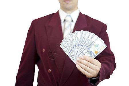 身穿商业西装的人有百元钞票的粉丝在白人背景背景图片
