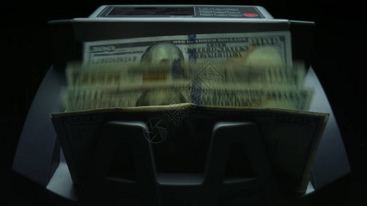 用于计算纸币的点钞设备银行金融业务的自动机制一百美元的货币兑换特写货币计数机图片