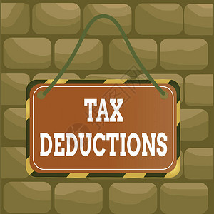 手写文本减税可对费用征税的概念照片减少收入板附字符串颜色黑黄框空图片