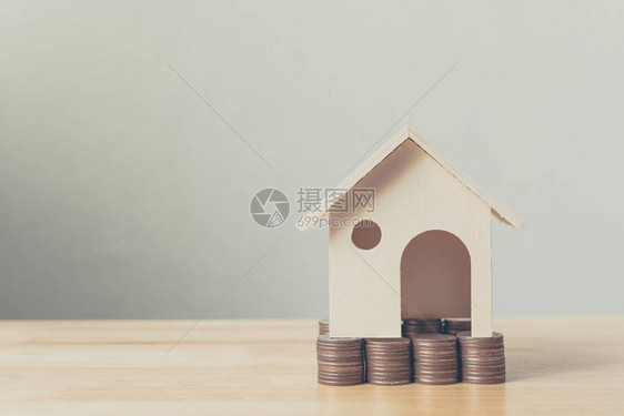 财产投资和住房抵押贷款金融概念住房模式和现成硬币作为金融和银行业图片