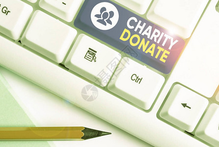 写字条显示慈善捐赠个人向非营利组织赠送礼背景图片