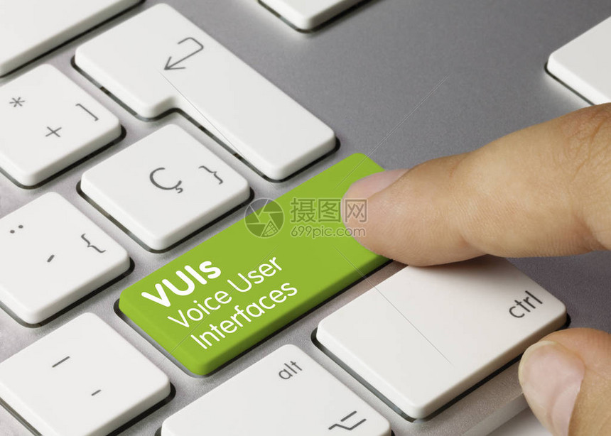 VUIs语音用户界面在金属键盘绿键上刻录Fin图片