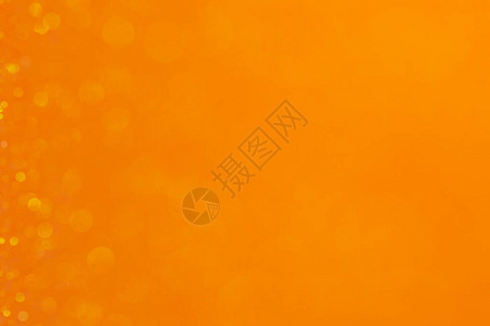 抽象散景圈橙色背景图片