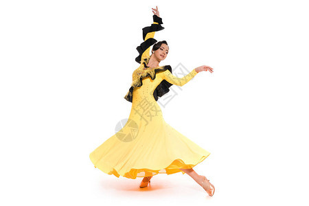 穿着黄色礼服在白色上跳舞的优雅图片