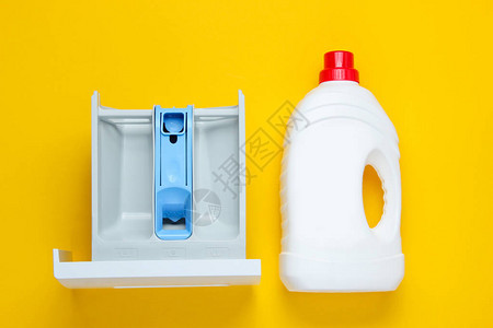 粉末洗衣机黄色背景的洗凝胶瓶等洗涤机容量图片