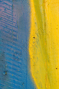 涂半黄蓝风化混凝土墙体纹理图片
