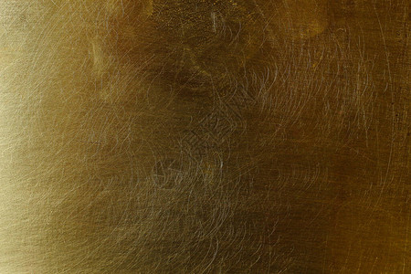 旧黄铜的划伤纹理表面背景背景图片