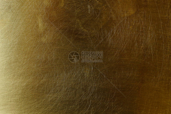 旧黄铜的划伤纹理表面背景图片