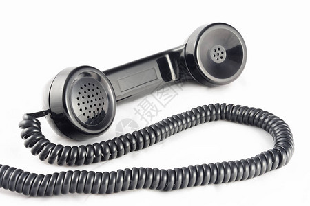 旧式的电话听筒黑色有卷圈复古风背景图片
