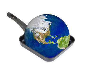 全球升温概念地球在煎锅图片