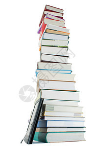 白色背景的高堆书本和电子书籍阅读器图片
