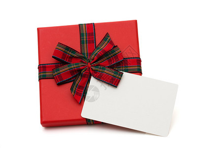 圣诞礼物与一张空白卡上白色隔离图片