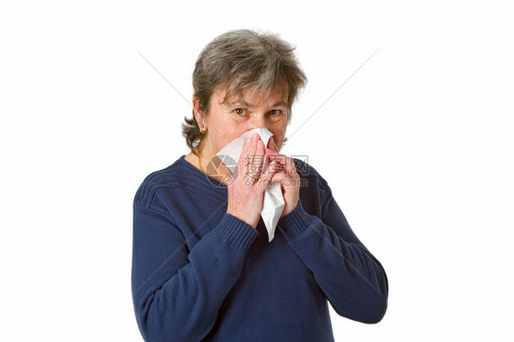 高级妇女用手帕打鼻涕孤立图片