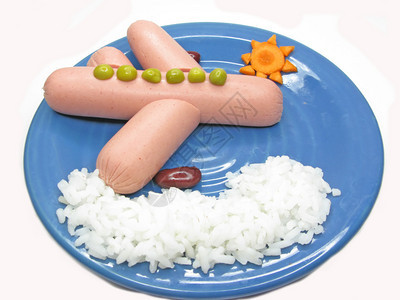 创意米粥配香肠平面造型图片