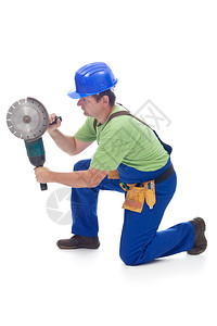 使用电动工具用研磨机跪在地板上的工人图片