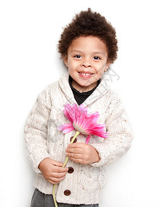 可爱的孩子笑着大粉红花孤图片
