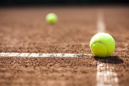 网球场地：特写嬉戏的网球运动图片