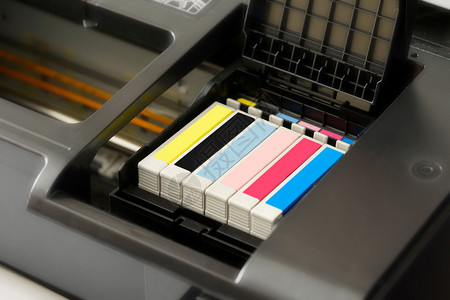 CMYK彩色调板办公室打印机中单背景图片