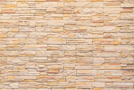 现代风格设计装饰不均匀裂开石质墙壁表面与水泥的布局图片