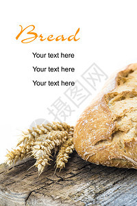 小麦面包在切口板上耳鸣小面包孤立图片