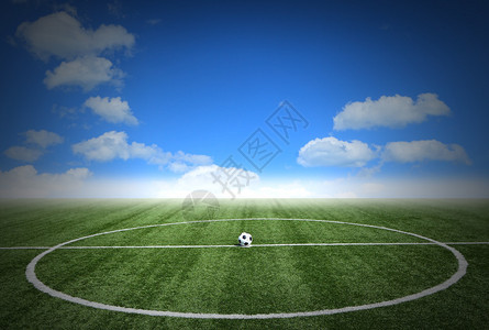 蓝天白云背景的足球绿草地蓝色图片