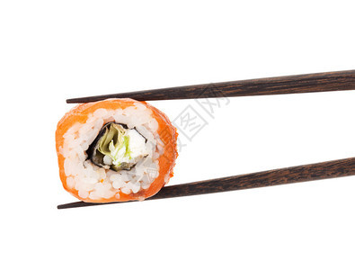 竹棍中的寿司木薯片白图片