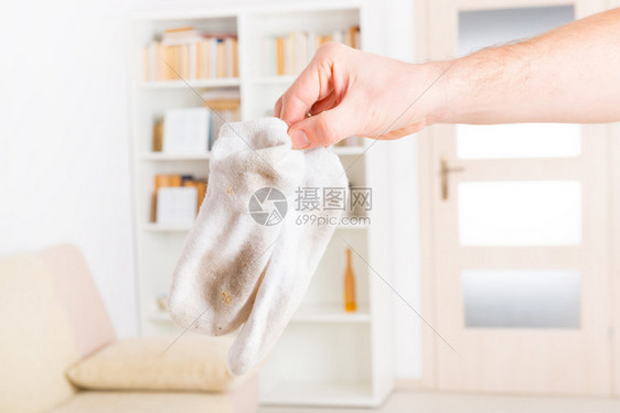 手握脏白袜图片