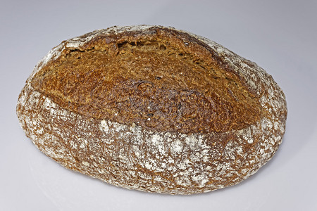 新鲜的面包小麦粉水黑麦粉葵花籽酵母亚麻籽燕麦芽粉芝麻油盐小麦胚芽糖和烘焙酵母的配方来自1925年左右背景图片