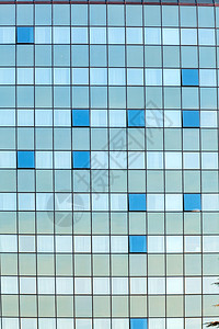 现代建筑上开窗的玻璃幕墙图片