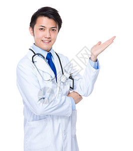 穿白大衣的男亚洲人医生手图片