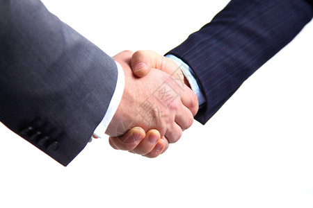 谈判桌握手缔结合同的商务会商背景图片